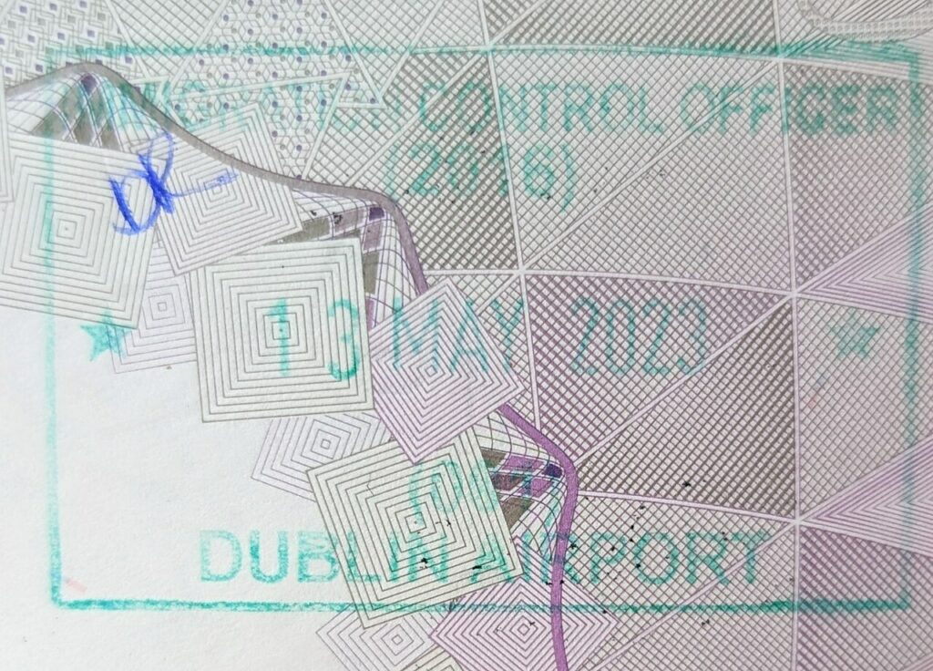 Irish passport stamp in a British passport